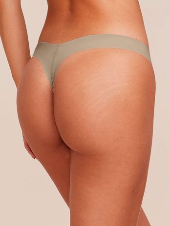 Tanga de microfibra de ante beige nude